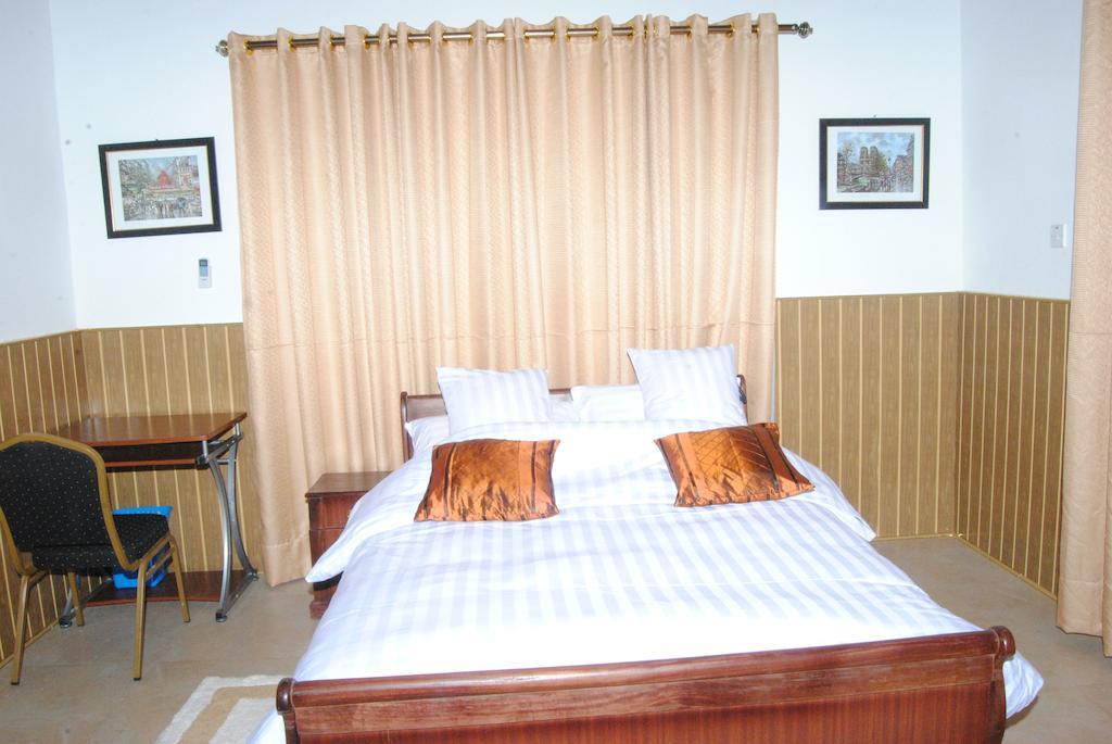 Okumah Hotel Кумаси Стая снимка