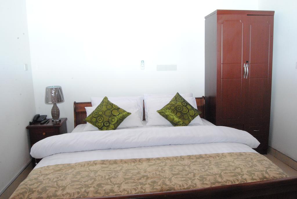 Okumah Hotel Кумаси Стая снимка